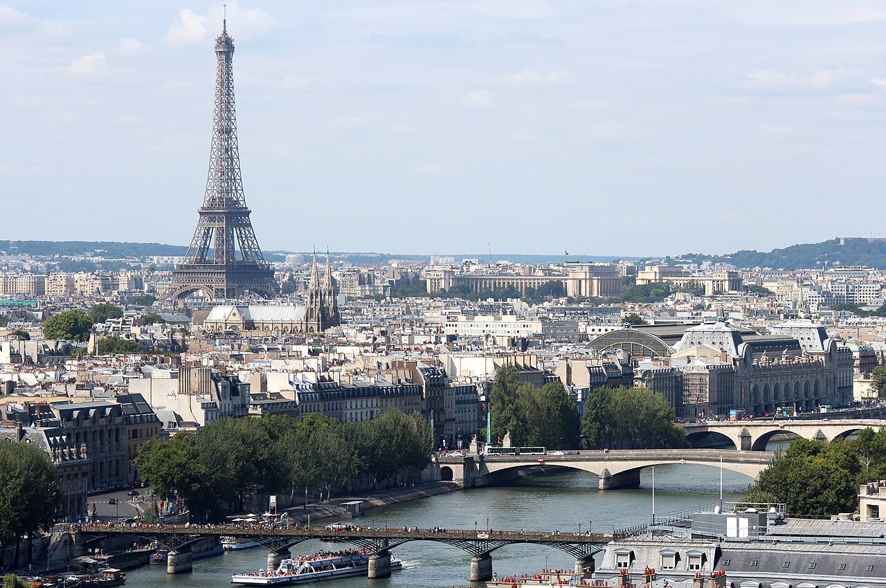 Paris rooftops and the Seine toward the Eiffel Tower